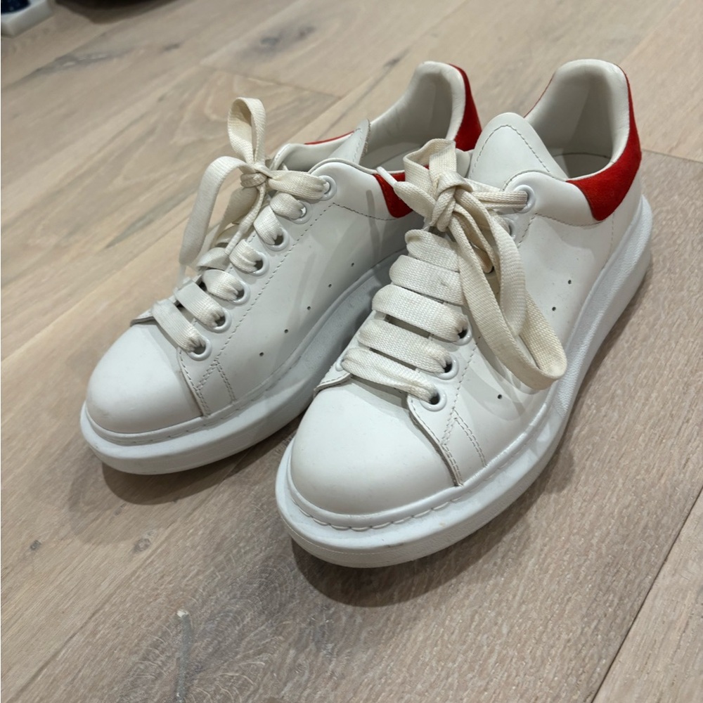 White and Alexander McQueen Red Sneakers
Lightly worn